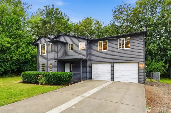 Ample parking with 2-car garage. Ample parking with 2-car garage.