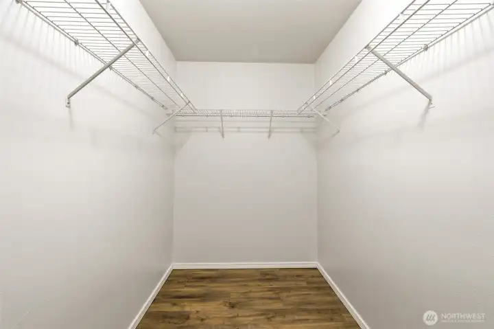 Primary walk-in closet Primary walk-in closet