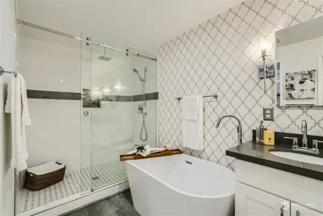 Luxuriate in the standalone soaking tub or large shower.