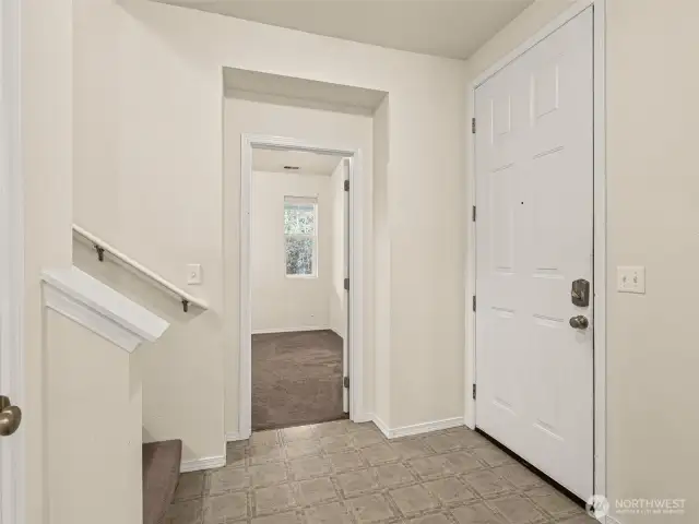 Entry with vaulted ceiling & tall door