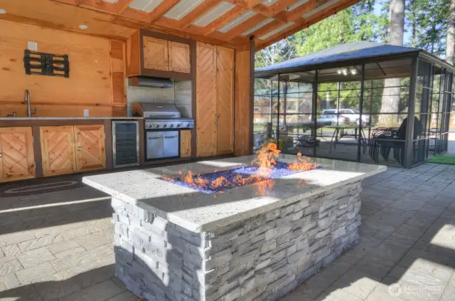 PROPANE FIRE TABLE CONNECTED TO THE IN GROUND PROPANE TANK