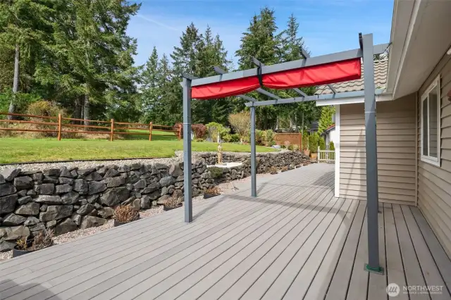 Spacious back deck with views of the golf course just off the kitchen!