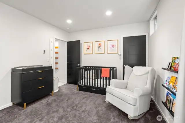 Bedroom features additional under stairs closet.