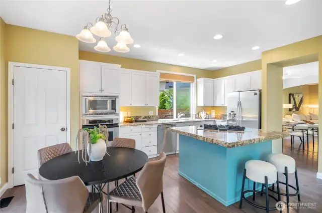 An adjoining casual dining area and a pantry for storage add to the appeal of this kitchen. Plus, there's easy access to the formal venues.