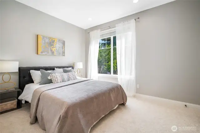 Main floor bedroom with adjacent 3/4 bath.
