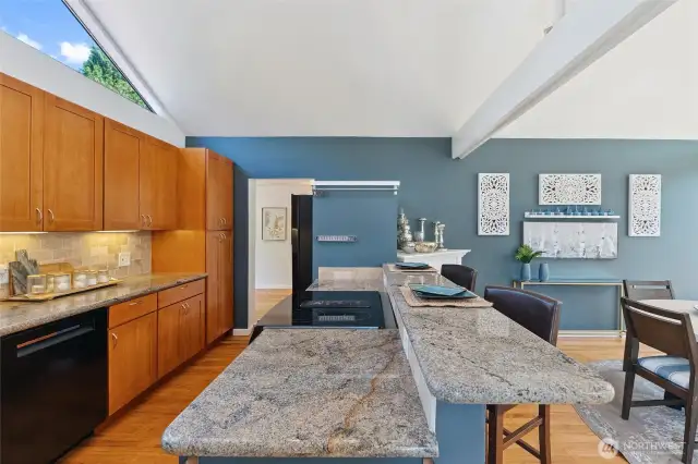 Passage through kitchen takes you to family room and access to 3 bedrooms and 1 bath.