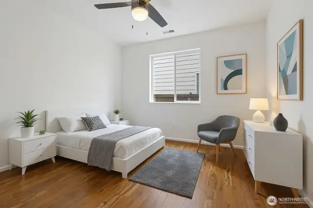 Virtually staged downstairs bedroom/office #1.