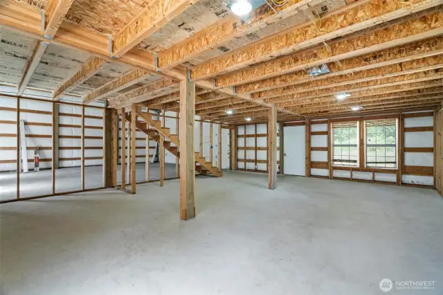 Shop with framed in  Addition-  Plumbing roughed in for Bathroom.