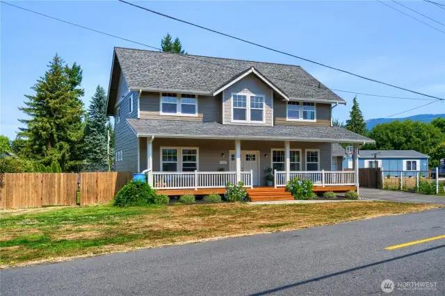 Lovely curb appeal with everyone's favorite- a covered front porch!