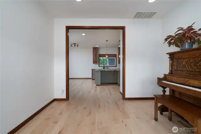 Looking toward kitchen from dining room.
