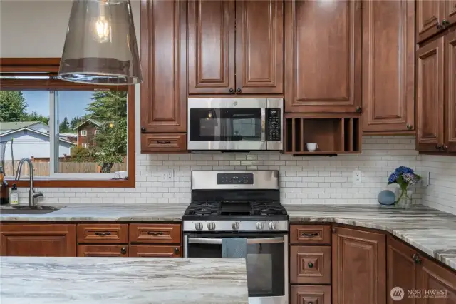 Lots of cabinet space and thoughtful storage options!