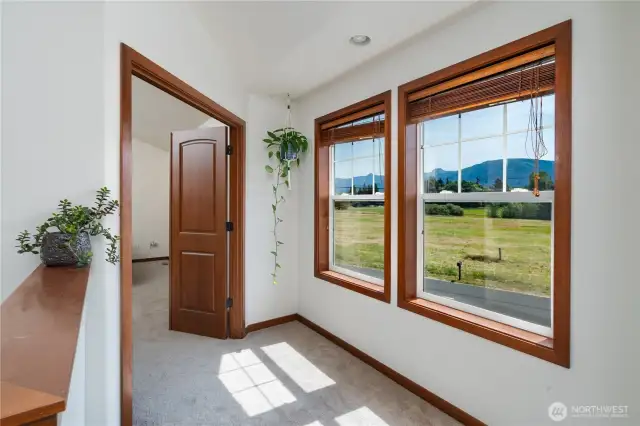 Wood cased windows and trim and blinds throughout.