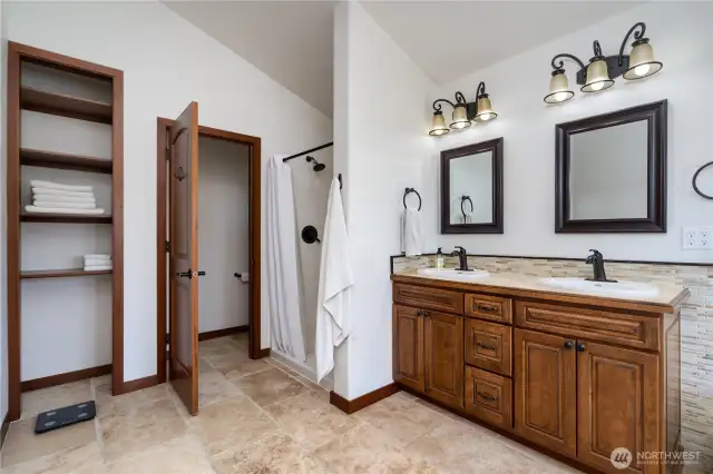 Primary bath storage and shower.