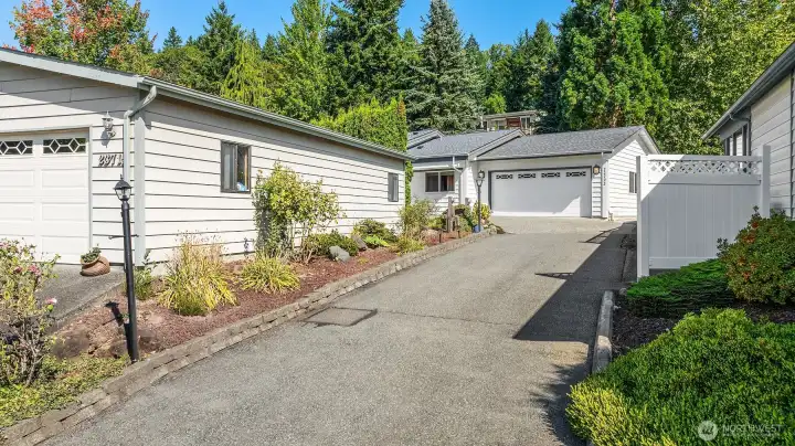 Home sits at the end of the longer driveway.