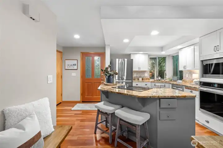 Plenty of room for family, friends, kids, and more at the eat in Island and space for a large dining table.