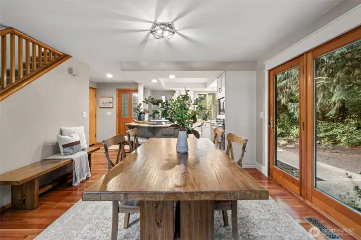 The dining area features French doors out to the wrap around stamped concrete patio.