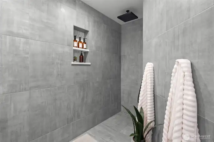 The walk in shower with no door or curtains to clean or worry about is a DREAM!