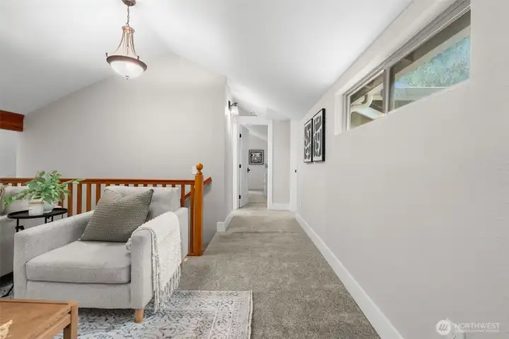 Down the hall are two very spacious rooms that are currently used as bedrooms and a FULL bathroom!