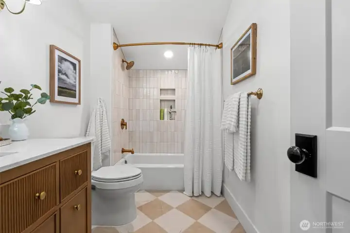 The full bathroom upstairs has been thoughtfully updated and feels like a spa.