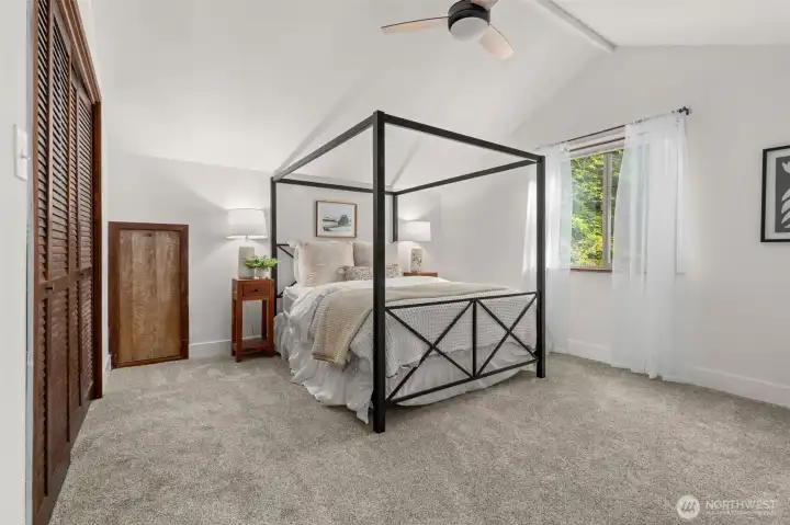 The final bedroom upstairs also has a vaulted ceiling and feels quiet and removed from the rest of the home.
