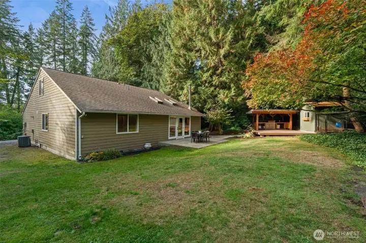 Almost all of the cleared yard space is usable at this home - around the house, up into the woods, there is room to play, spread out, plant, build, and make it your own.