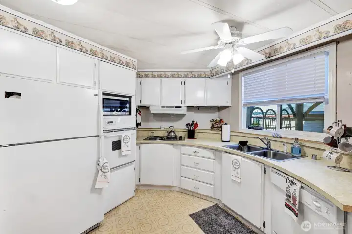 Another view of the kitchen. Great space for several individuals to be working at one time. Entertainers delight.