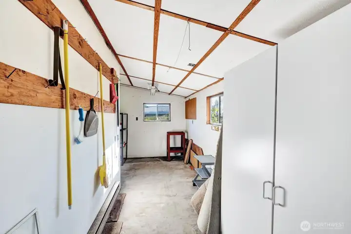 Nicely finished shop / storage area at the end of the carport. Power so could be workspace etc.