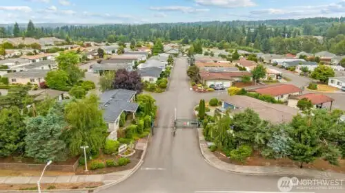 Aerial view of gated entrance into the park which shows the layout of the community.