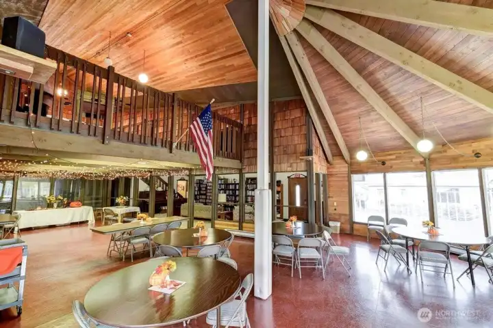 Another view of the lower level of the Clubhouse. Two kitchenettes for your convenience. Even room for dancing if you choose.