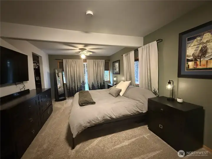 Primary bedroom with access to backyard.