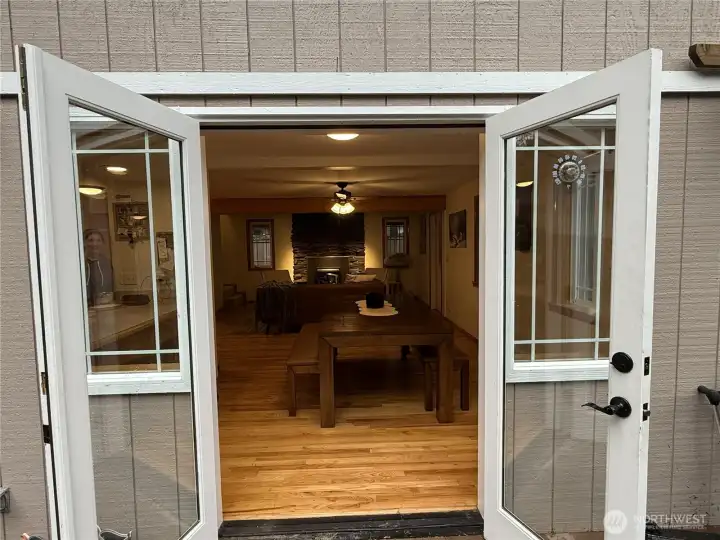 French doors open to deck/dining area.