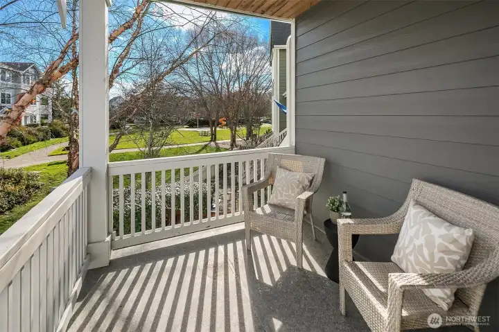 Front porch overlooking green space.