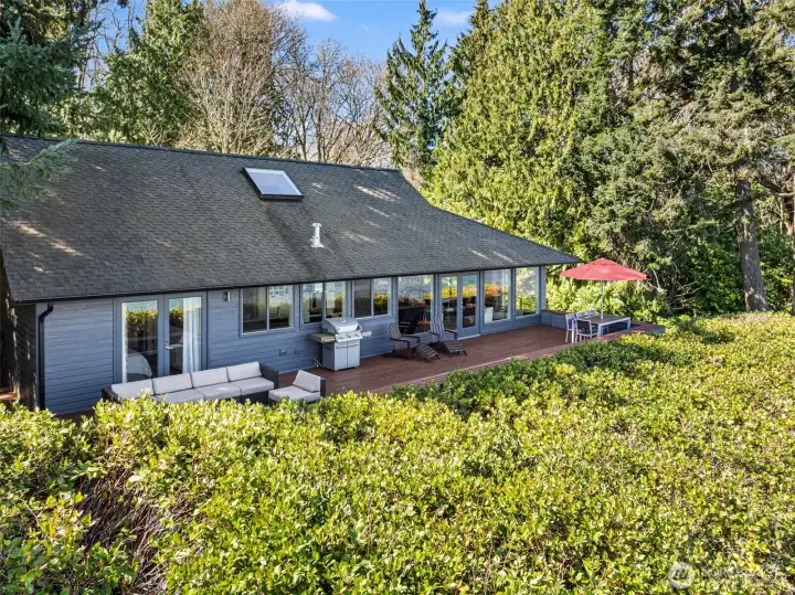 Mature landscaping and evergreens provide a wonderful sense of privacy