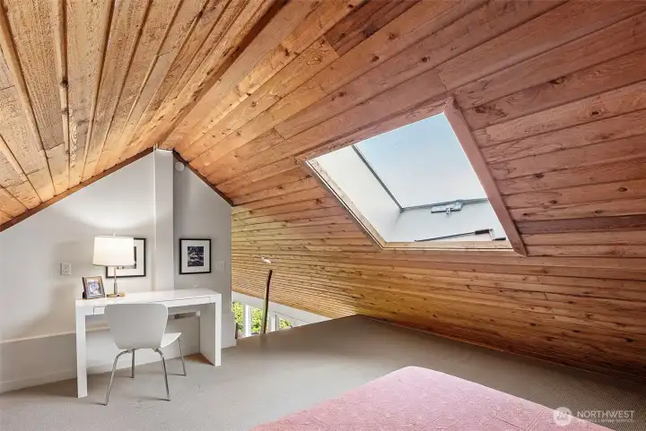 Lofted bedroom with work space