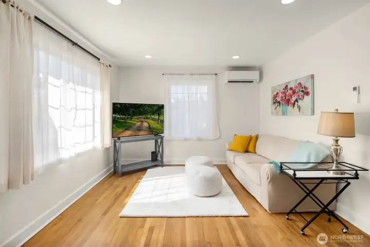 Living room with mini split heat pump.