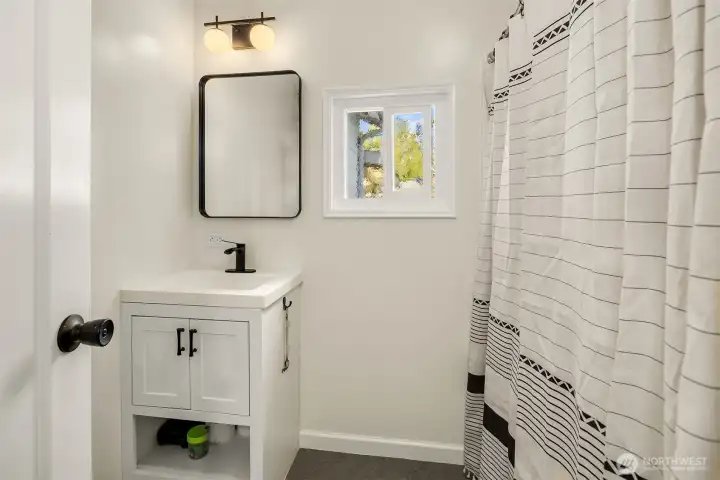 Full bath in hallway remodeled.