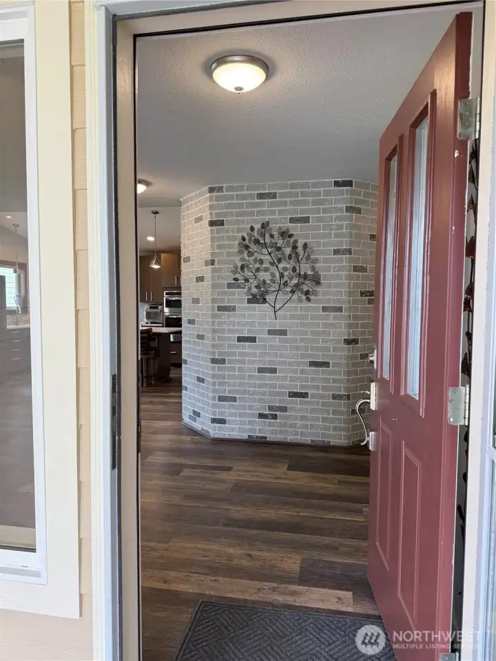 Entering the home, all updated flooring.