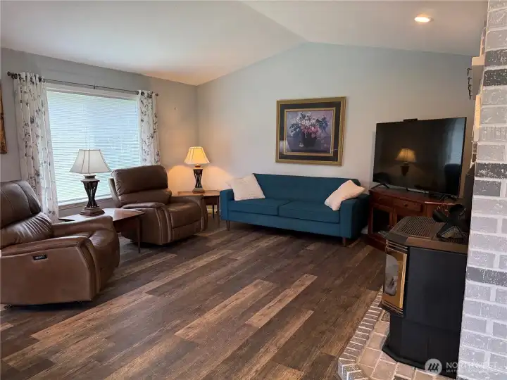 Living Room.  Note the flooring is throughout the home.