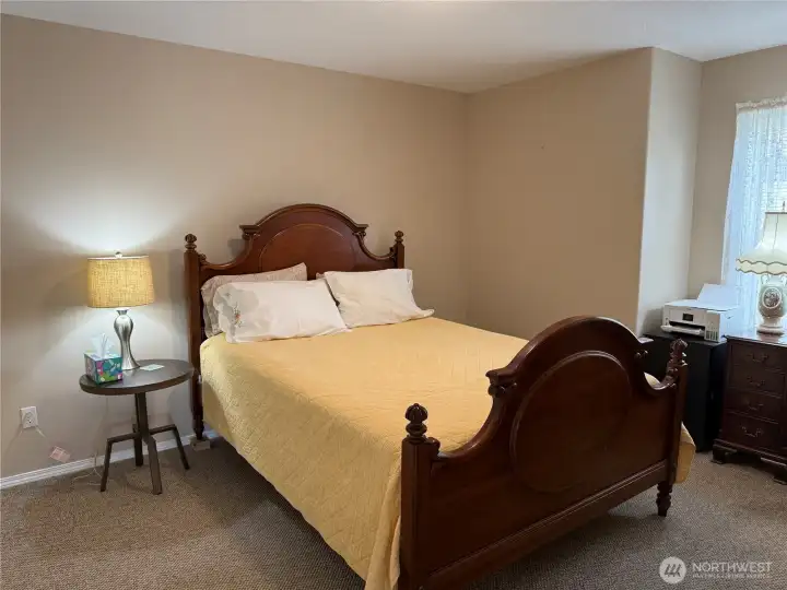 Comfortable size with large closets and window for lots of light. Bedroom is at front of house.