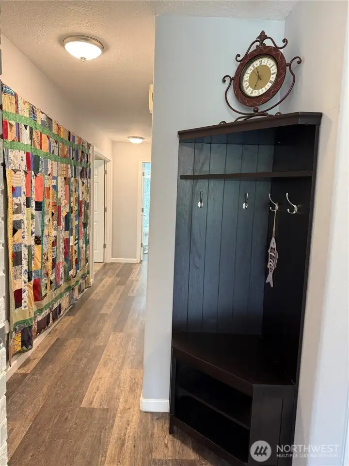 Looking down the hall to the other bedrooms.