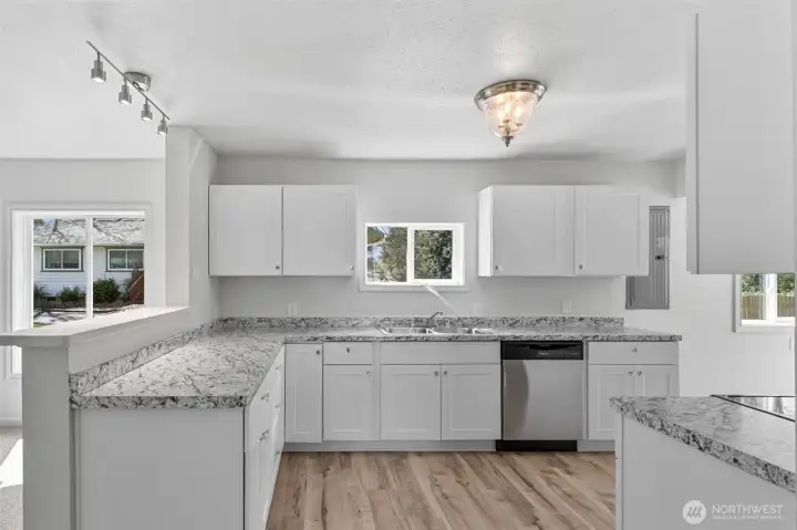 Kitchen is loaded with countertop space.