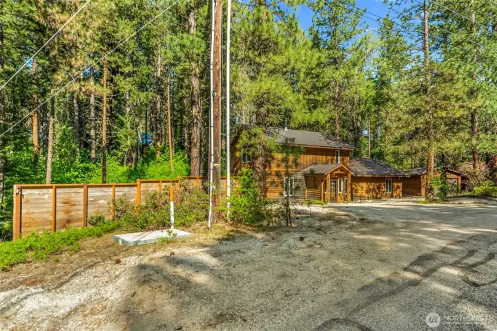 Privacy wall creates a sanctuary, the property offers 1.33 Acres