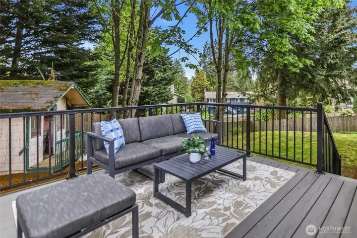 Large backyard perfect for fun, gardening, pets.