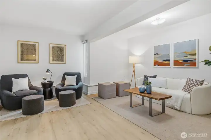 Large bonus room with access to backyard and garage.