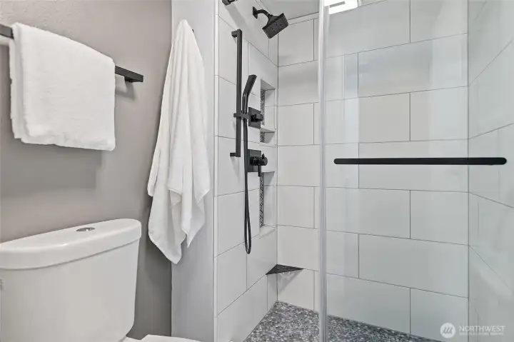 Primary bath walk-in shower.