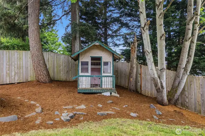Large fenced backyard.