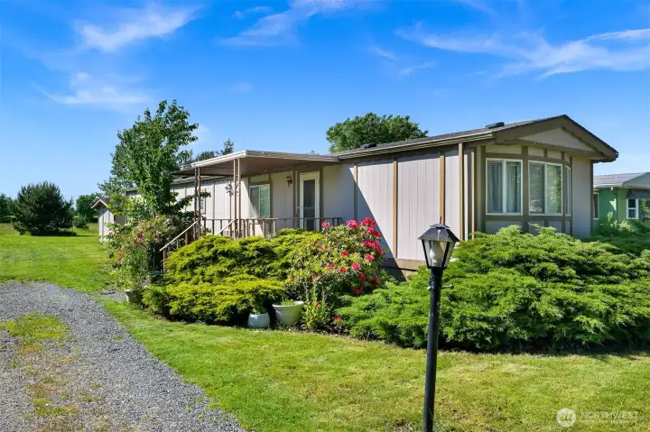 Welcome to Unit 13 at Royal Coachman, a peaceful and wonderfully located home tucked into a quiet, well-kept community between Lynden and Bellingham.