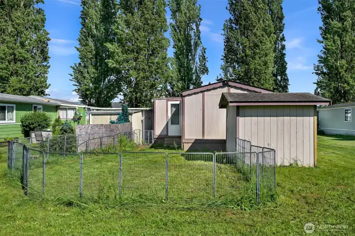 Fenced backyard space for pets.