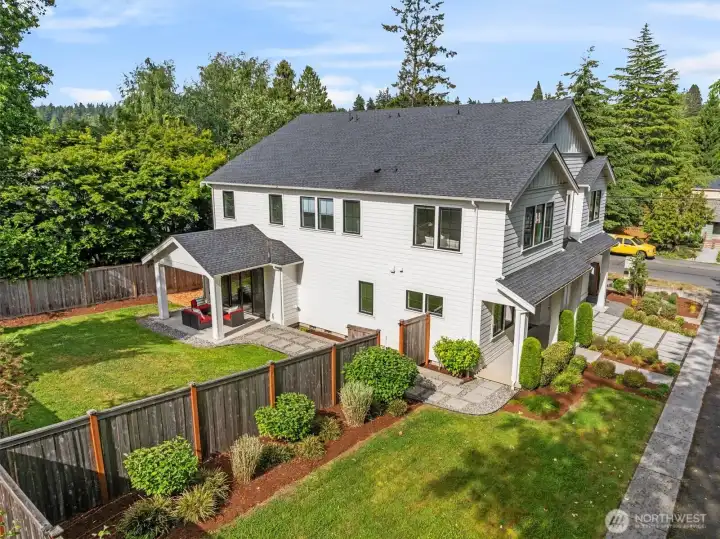 Aerial photo looking east. Large level fenced backyard! Sought after Broadview neighborhood.
