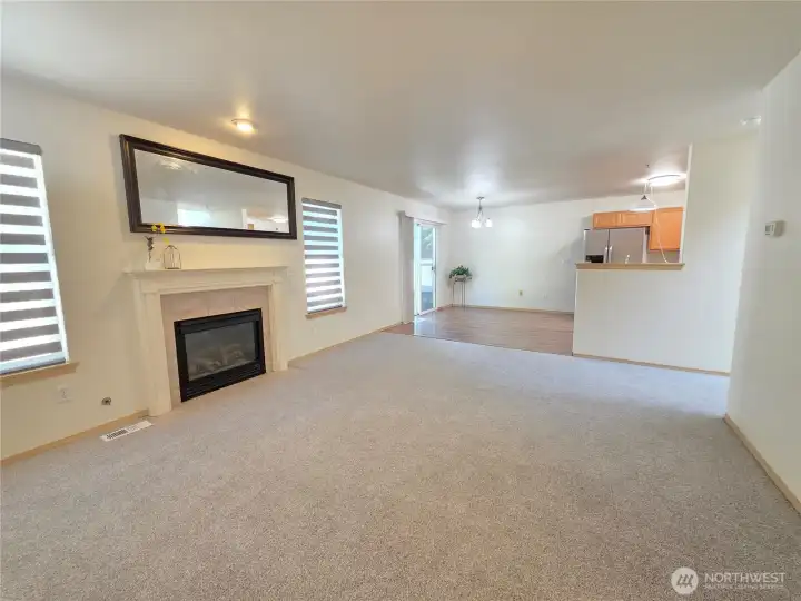 Cozy up in front of the gas fireplace in the living room.